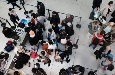 Passengers wait in a Transportation Security Administration line at John F. Kennedy International Airport on January 9th, 2019, in New York City. It has been reported that hundreds of TSA screeners and agents have called in sick from their shifts at a number of major airports as the partial government shutdown continues. Employees of the TSA, whose job it is to keep airlines safe, are working without knowing when their next paycheck is coming.