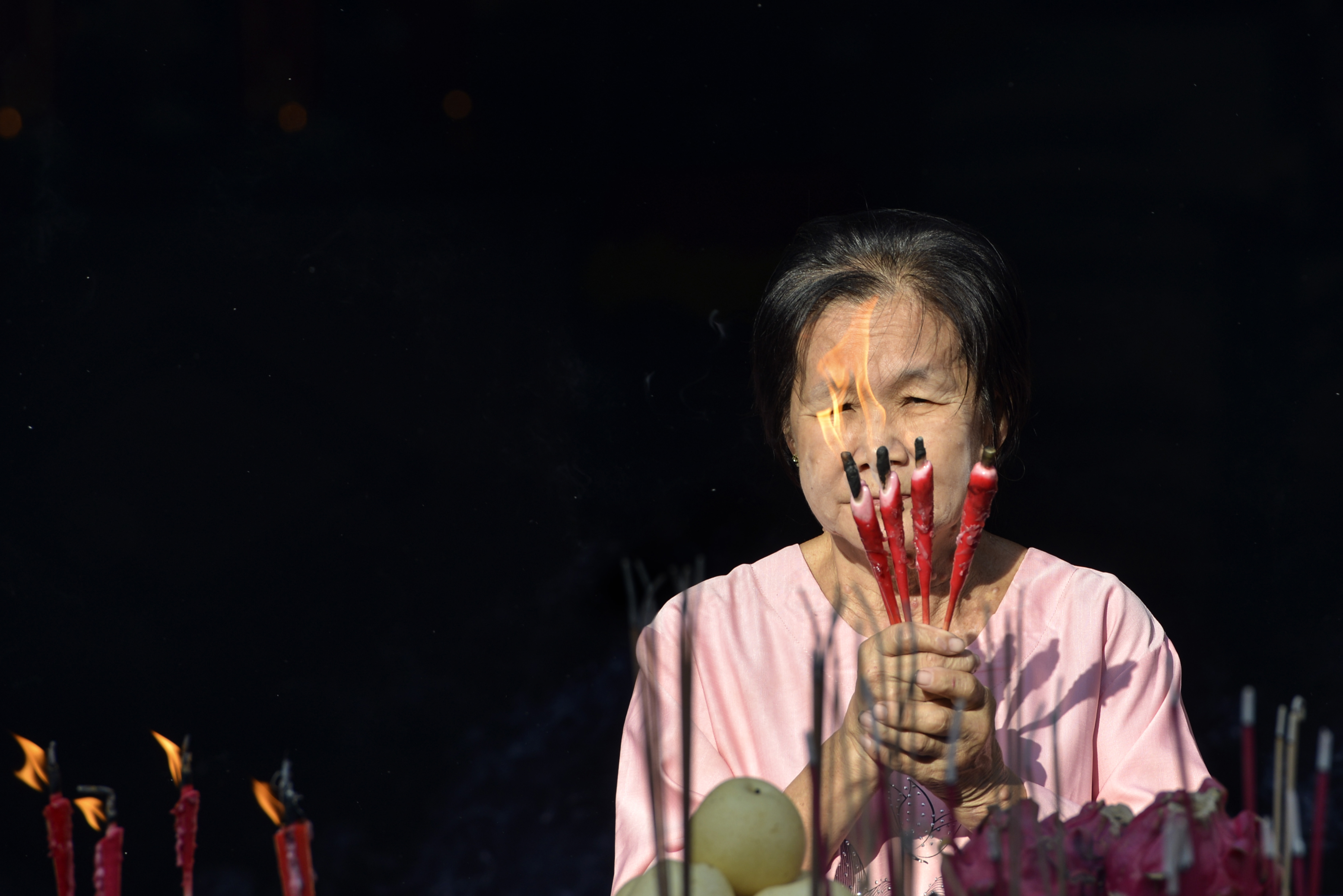 A woman prays at a Chinese temple to mark the Lunar New Year of the Pig in Banda Aceh, Indonesia's Aceh province, on February 5th, 2019.