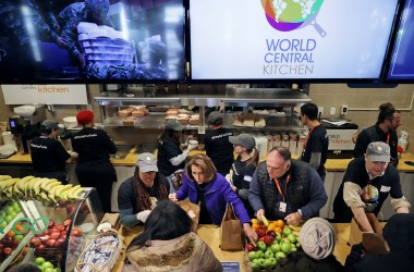 United States Speaker of the House Nancy Pelosi (center) and celebrity chef Jose Andres (second from the right) help distribute food to furloughed federal workers at the World Central Kitchen on January 22nd, 2019, in Washington, D.C. Founded by Andres, World Central Kitchen is a not-for-profit non-governmental organization devoted to providing meals in the wake of natural disasters—and, in this case, the government shutdown. The kitchen has been providing meals to workers affected by the partial federal government shutdown since January 16th and started giving away groceries and providing other services this week.