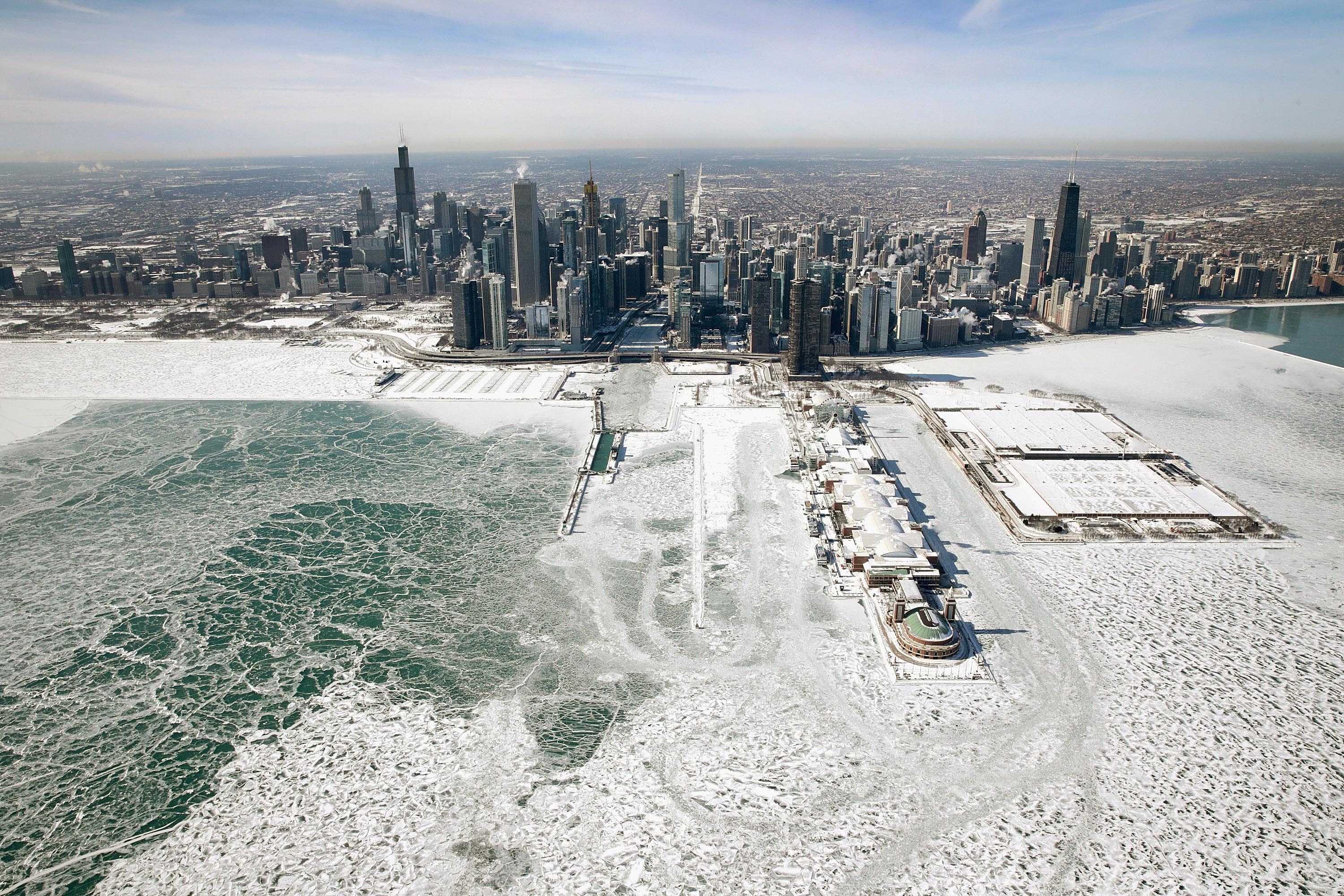 Ice builds up along the shore of Lake Michigan as temperatures dipped to lows around -20 degrees on January 31st, 2019, in Chicago, Illinois. Businesses and schools closed, Amtrak suspended service into the city, more than a thousand flights were canceled, and mail delivery was suspended as the city coped with record-setting low temperatures.