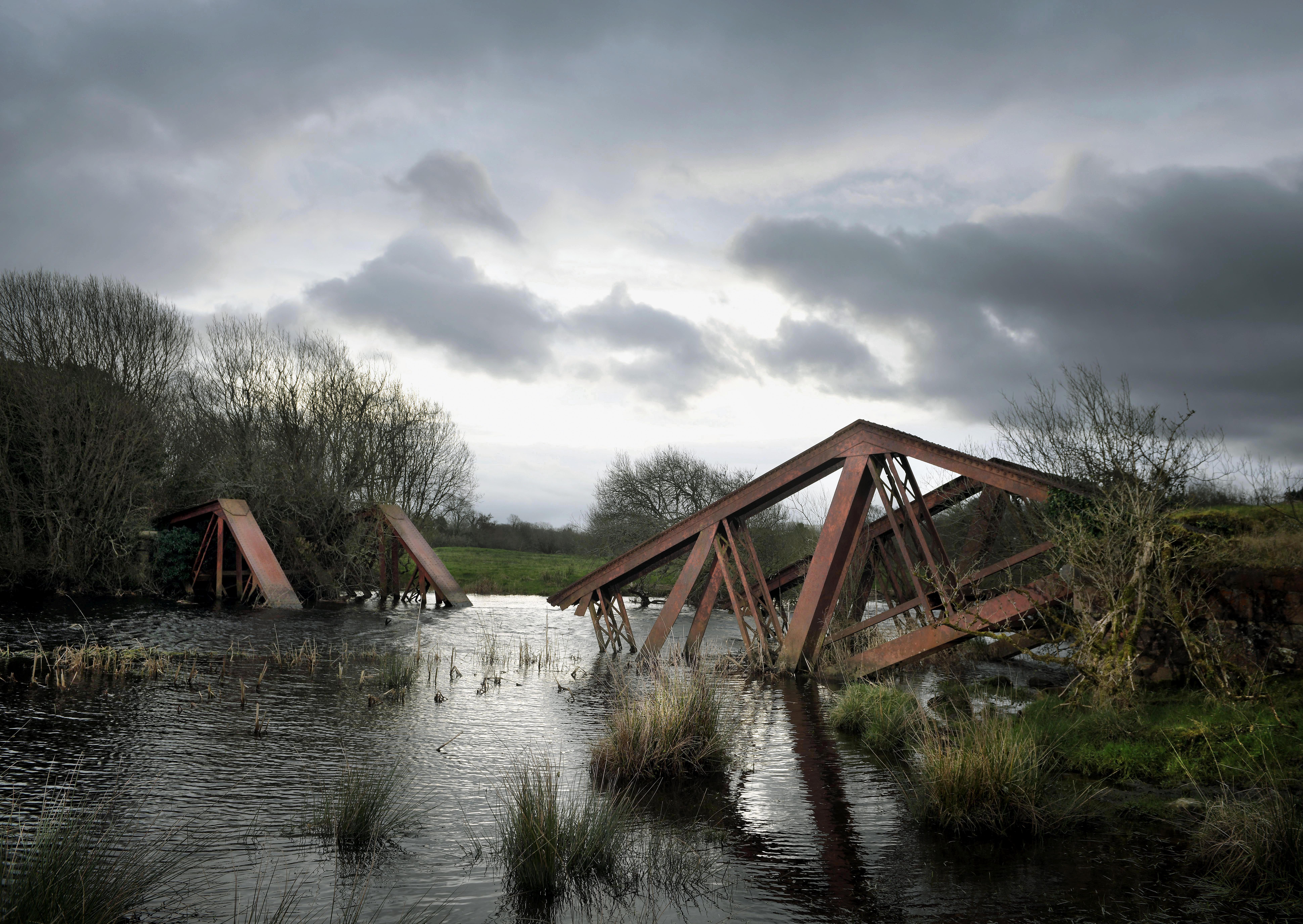 The remains of a railway bridge between the villages of Blacklion in the Republic of Ireland and Belcoo in Northern Ireland can be seen on February 22nd, 2019, in Belcoo, Northern Ireland. The bridge was blown up by the British army in the 1970s during the Troubles. Along the winding 499 kilometers of the Irish border are vestiges of a harder boundary: derelict customs houses, 