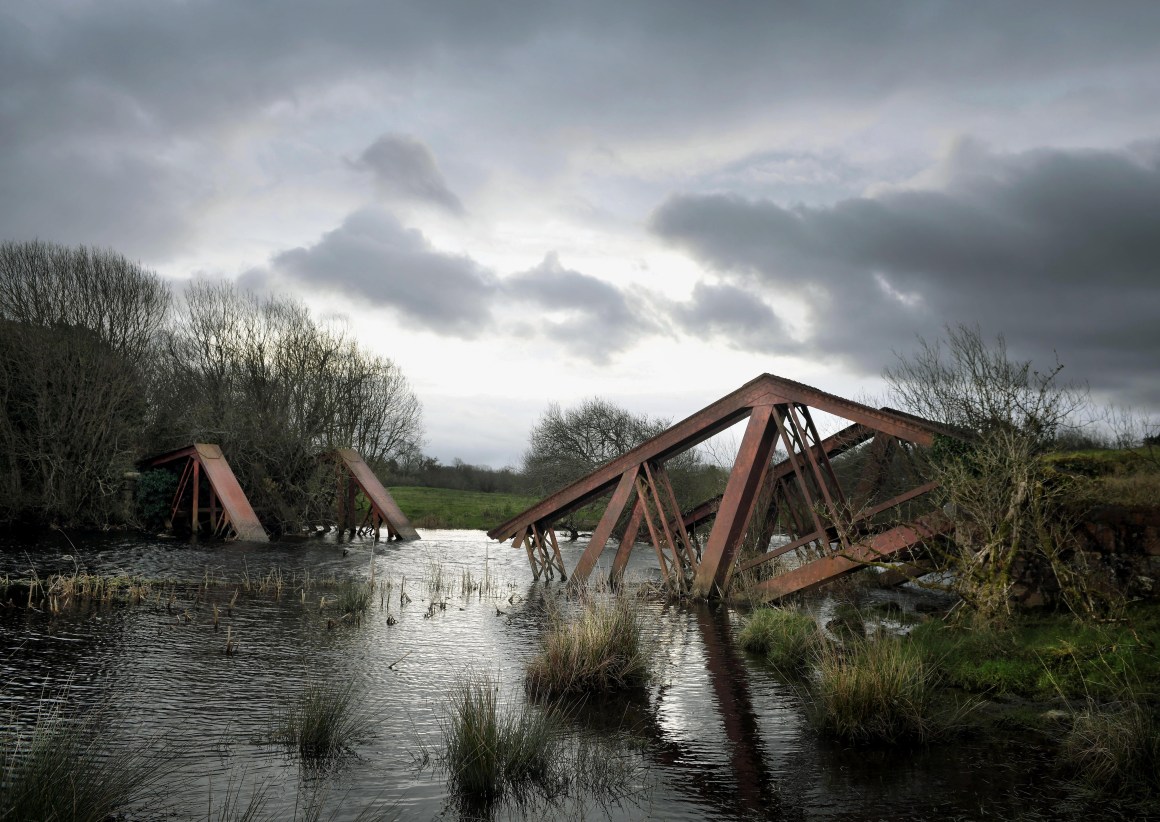 The remains of a railway bridge between the villages of Blacklion in the Republic of Ireland and Belcoo in Northern Ireland can be seen on February 22nd, 2019, in Belcoo, Northern Ireland. The bridge was blown up by the British army in the 1970s during the Troubles. Along the winding 499 kilometers of the Irish border are vestiges of a harder boundary: derelict customs houses, "dragon's teeth" bollards and two-toned tarmac. These relics evoke a time when movement between the countries was less free, and underscore what is at stake as the U.K. negotiates its exit from the E.U. Both parties have vowed to avoid a physical border, but, as the Brexit deadline approaches on March 29th, a final agreement has so far eluded them.