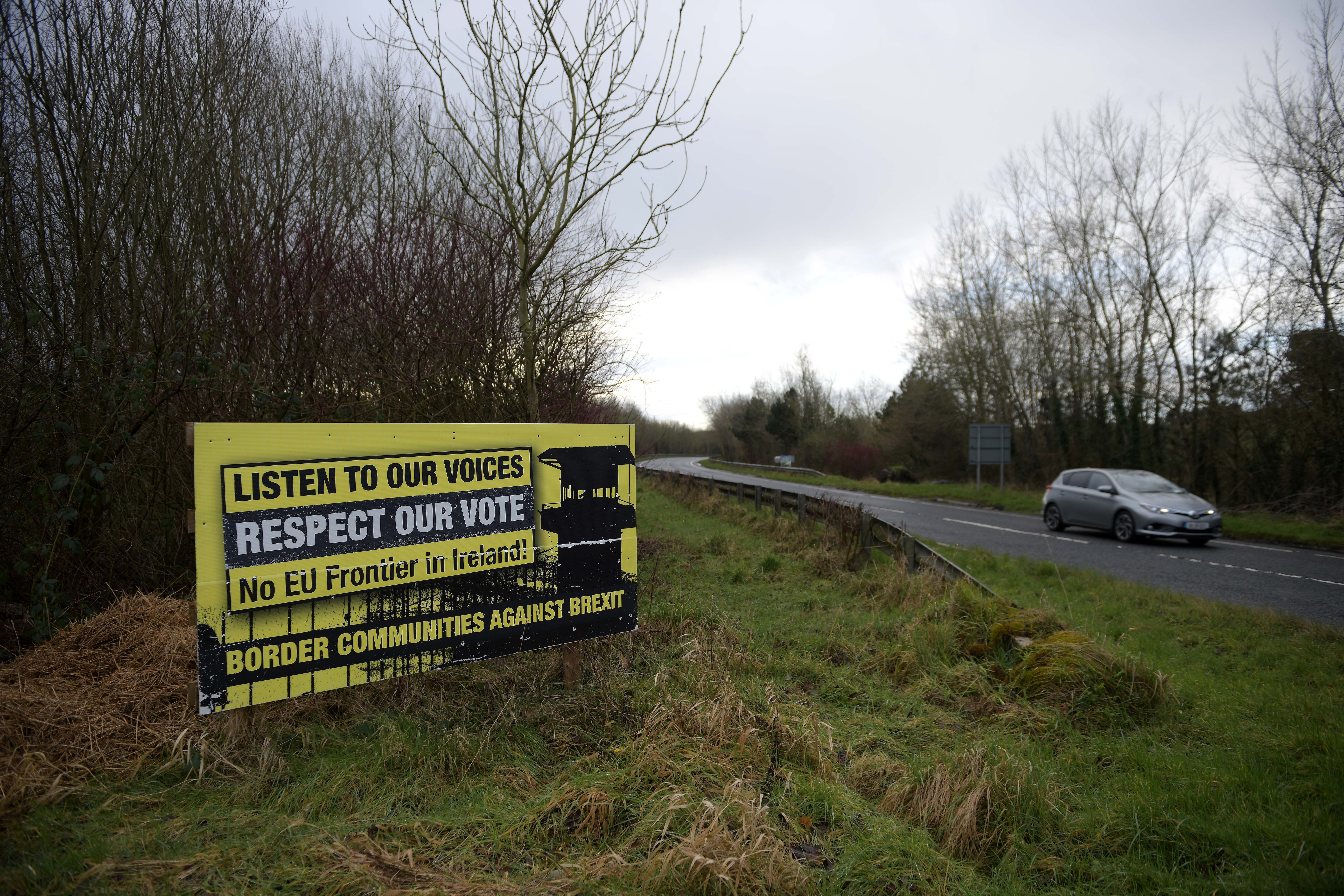 A Border Communities Against Brexit sign can be seen on Aghalane Bridge on February 17th, 2019, in Aghalane, Ireland. Britain will leave the E.U. on March 29th following the referendum in 2016. Many people in Northern Ireland and Ireland are concerned about a return of a so-called hard border, which could inspire unrest reminiscent of the Troubles.