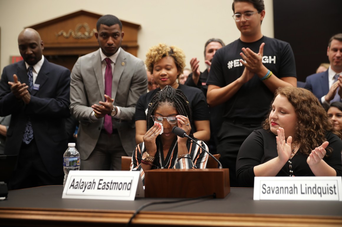 Aalayah Eastmond, a survivor of the mass shooting at Marjory Stoneman Douglas High School in Parkland, Florida, wipes away tears as she receives a standing ovation while testifying to the House Judiciary Committee on February 6th, 2019.