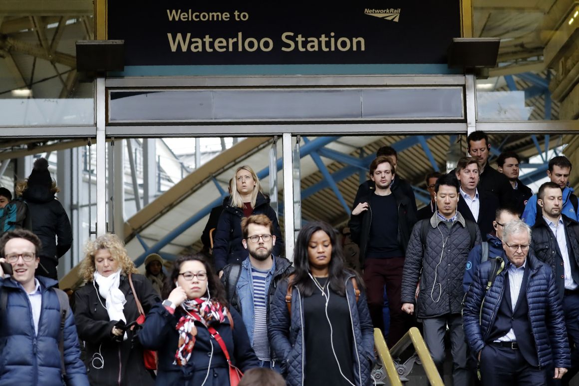 Commuters walk at Waterloo station in central London on March 6th, 2019, a day after a suspicious package was found at the station.