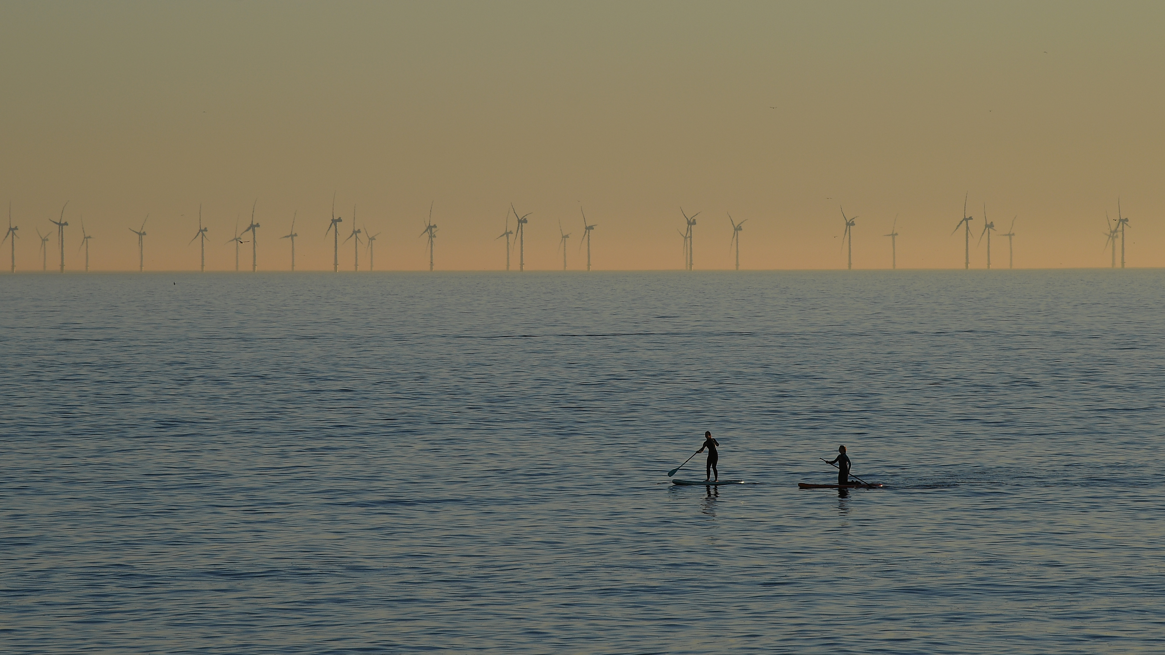 Paddleboarders take to the water on February 25th, 2019, in Brighton, England.