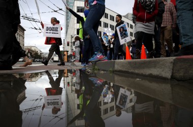 A San Francisco city worker holds a sign as workers march during a rally outside of the City and County of San Francisco Human Resources office on March 7th, 2019, in San Francisco, California. Hundreds of San Francisco city workers staged a rally to demand a fair contract that addresses pay equity for women.