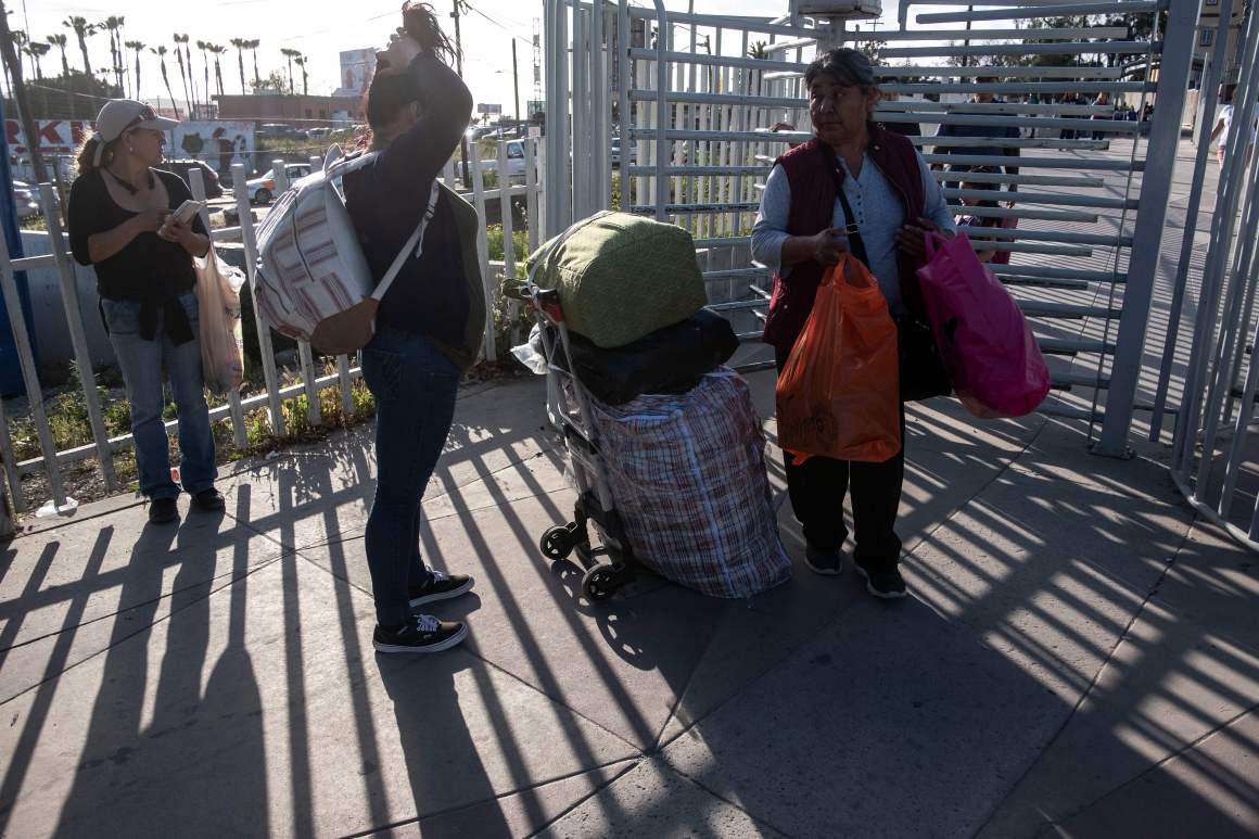 People walk back to Tijuana from San Diego at San Ysidro crossing port in Tijuana, Mexico, on April 2nd, 2019.