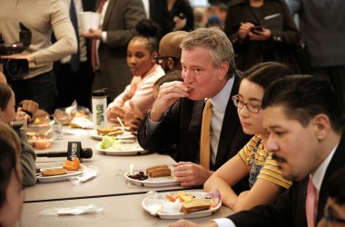 New York Mayor Bill de Blasio joins Schools Chancellor Richard Carranza and school children for lunch at P.S. 130, a Brooklyn public school, for an announcement about Meatless Mondays on March 11th, 2019, in New York City.