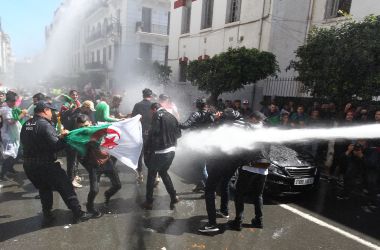 Algerian security forces use a water canon to disperse students taking part in an anti-government demonstration in the capital city of Algiers on April 9th, 2019. Lawmakers named the speaker of the upper house as Algeria's first new president in two decades on Wednesday, after the resignation of Abdelaziz Bouteflika following mass protests.