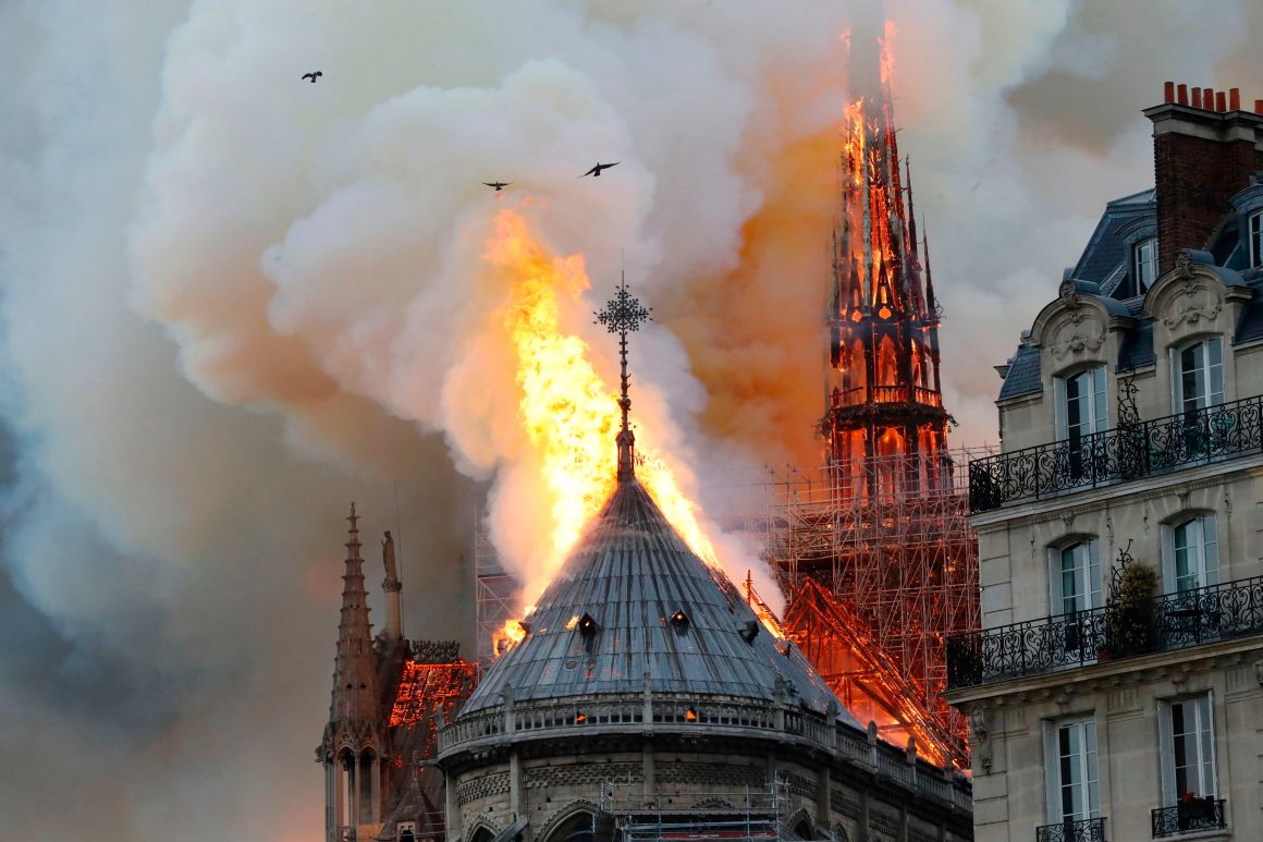 Smoke and flames rise during a fire at Notre Dame Cathedral in central Paris on April 15th, 2019.