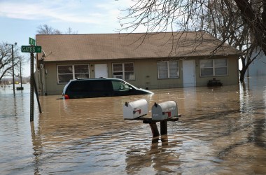 An apartment building is surrounded by floodwater on March 22nd, 2019, in Craig, Missouri.