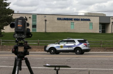 Police patrol outside Columbine High School on April 17th, 2019, in Littleton, Colorado, as all Denver-area schools were evacuated and classes canceled after an active threat to the area.