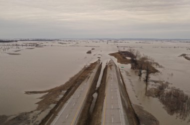 Following a bomb cyclone that dumped rain and melted snow across the Midwest, many sates—Iowa, Missouri, and Nebraska, especially—have experienced flooding. Pictured here, floodwater covers Highway 2 on March 23rd, 2019, near Sidney, Iowa.