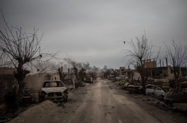 Destroyed vehicles are seen in the final ISIS encampment on March 24th, 2019, in Baghouz, Syria.