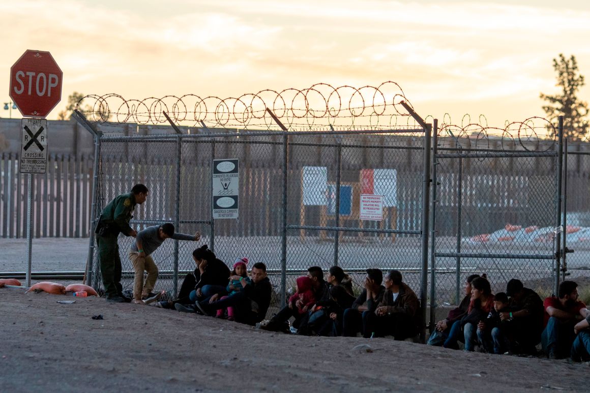 Border Patrol agents are pictured detaining and processing a group of migrants near the Paso Del Norte International Bridge connecting the U.S.–Mexico border cities of El Paso, Texas, and Ciudad Juárez, Chihuahua, on the evening of April 18th, 2019, in El Paso.