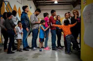 Migrant children from different Latin American wait to receive food at the Casa del Refugiado, or The House of Refugee, in El Paso, Texas, on April 24th, 2019.