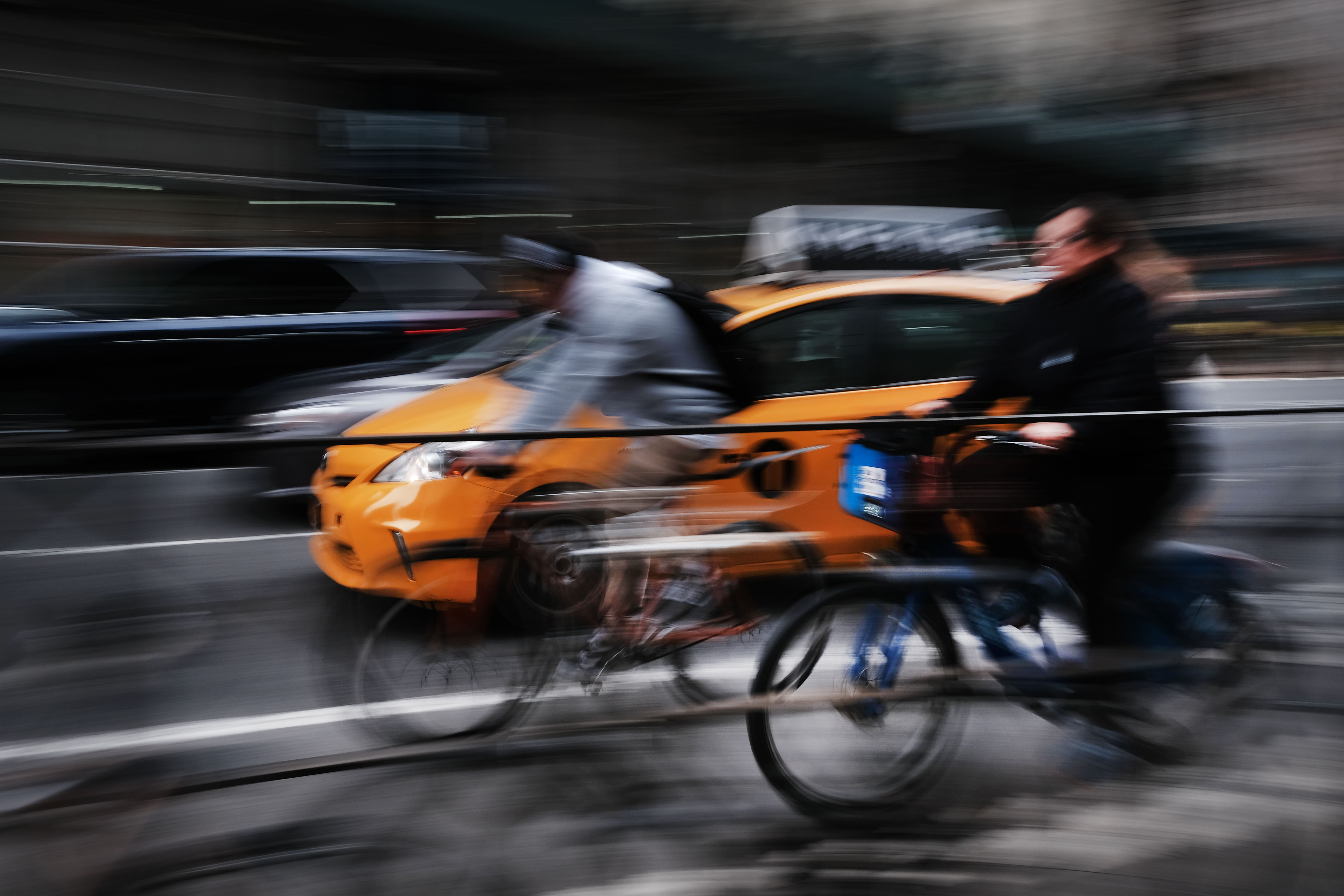 Cars and bicyclists travel on a busy Manhattan street on April 2nd, 2019, in New York City. In an effort to ease traffic delays and to increase funding for public transportation, New York City has passed a plan for congestion pricing for all vehicles traveling into Manhattan south of 61st Street.