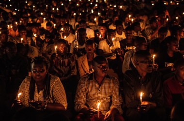 At a commemoration ceremony during the 25th anniversary of the Rwandan genocide, in which 800,000 Tutsis and moderate Hutus were killed over a 100-day period, people hold candles at Amahoro Stadium in Kigali, Rwanda, on April 7th, 2019.