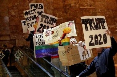 Protesters gather as New York City Mayor Bill de Blasio holds a Green New Deal rally at Trump Tower in New York City on May 13th, 2019. De Blasio recently unveiled his Green New Deal to reduce carbon emissions in New York City.