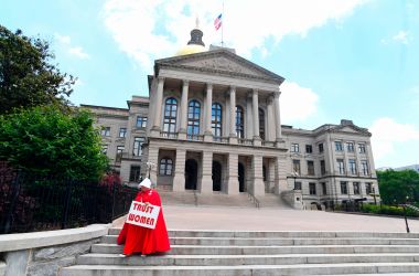 Activist Tamara Stevens with the Handmaids Coalition of Georgia leaves the Georgia Capitol after Democratic presidential candidate Senator Kirsten Gillibrand addressed an event to speak out against the recently passed "heartbeat" bill on May 16th, 2019, in Atlanta, Georgia.