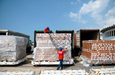 Workers unload medicines and disposable medical supplies from a Chinese Yangtze River Express Airlines Boeing 747 cargo plane after landing at Simon Bolivar International Airport on May 16th, 2019, in Maiquetia, Venezuela.