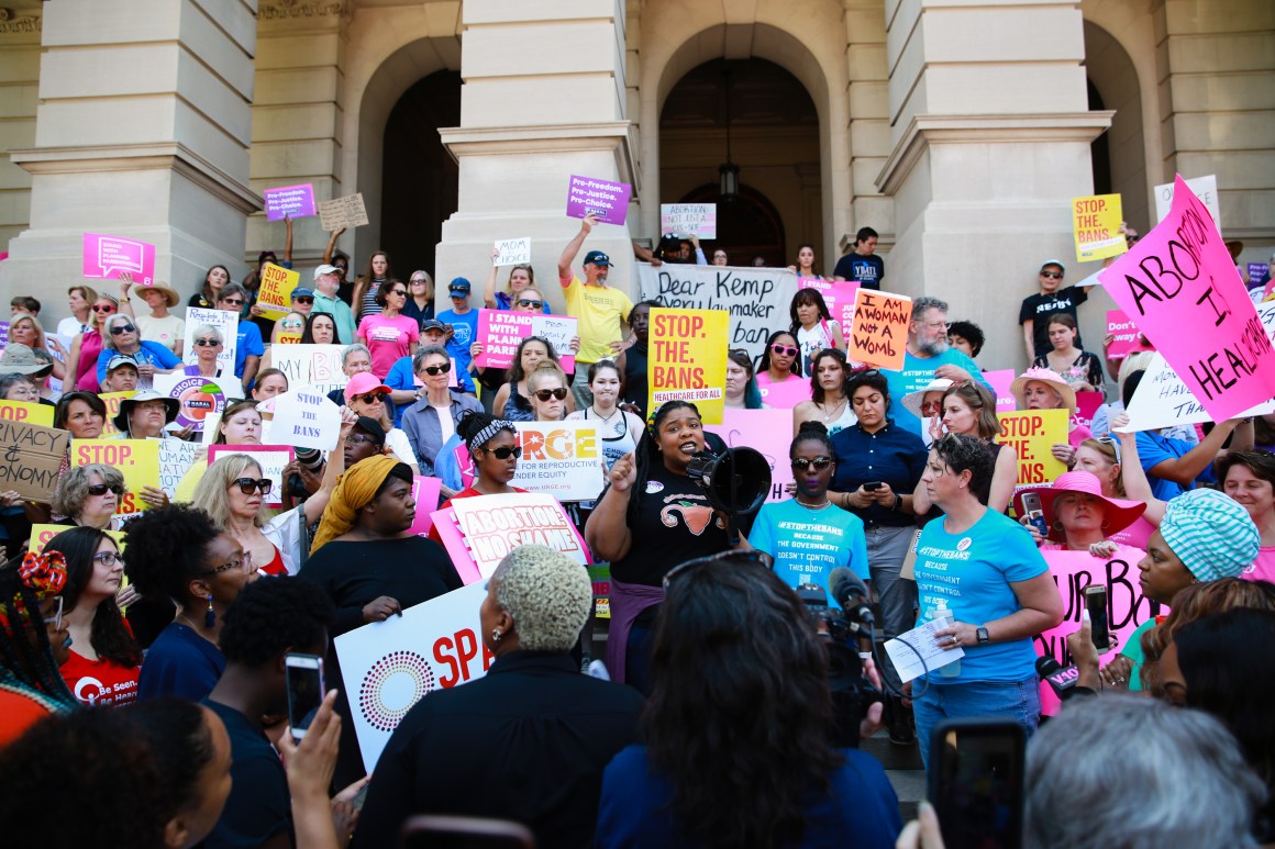 A woman speaks during a protest against recently passed anti-abortion bills at the Georgia State Capitol building in Atlanta, on May 21st, 2019.