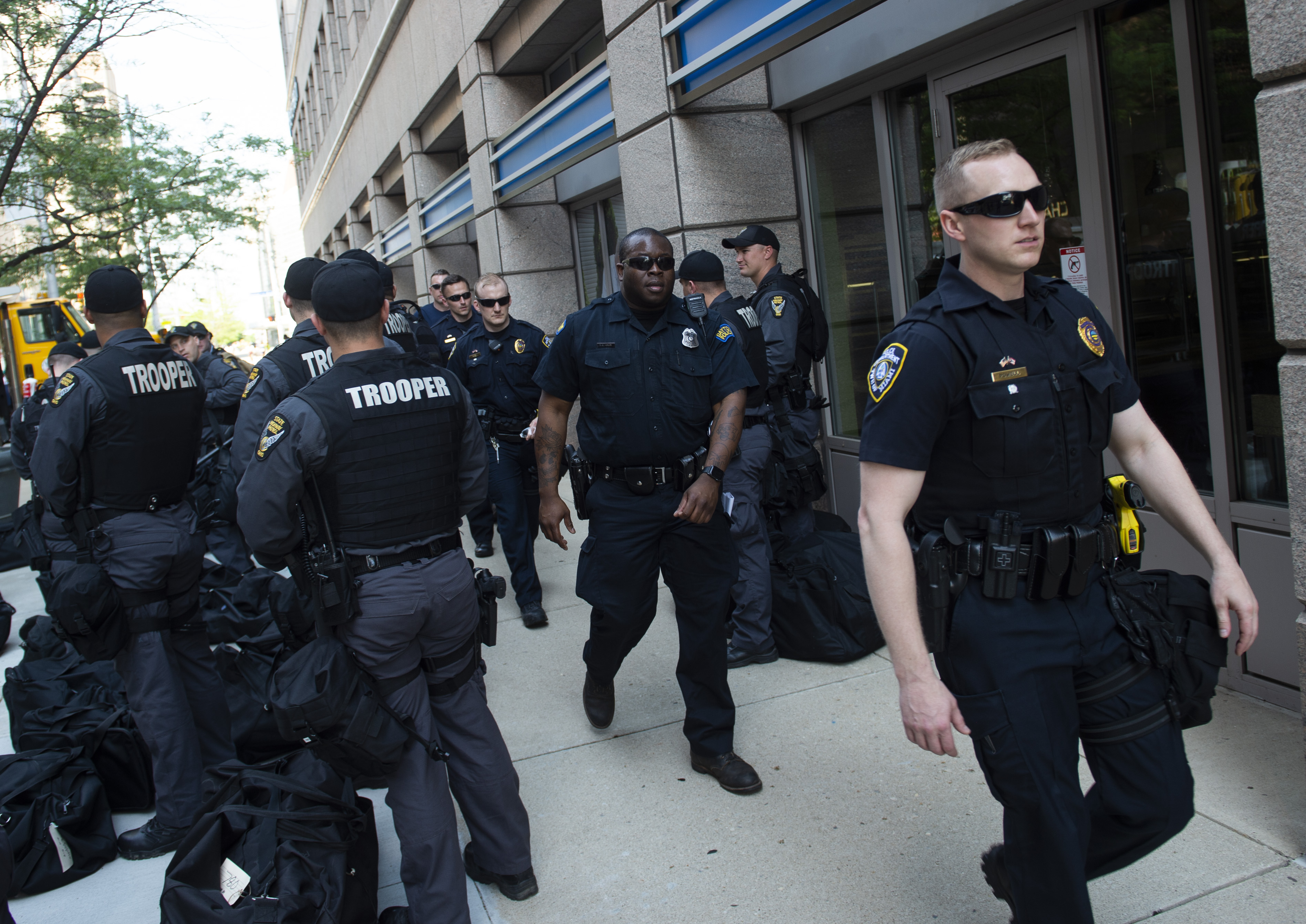 Law enforcement officers keep careful watch over the various activities occurring during a rally held by the Honorable Sacred Knights of Indiana at Courthouse Square on May 25th, 2019, in Dayton, Ohio.