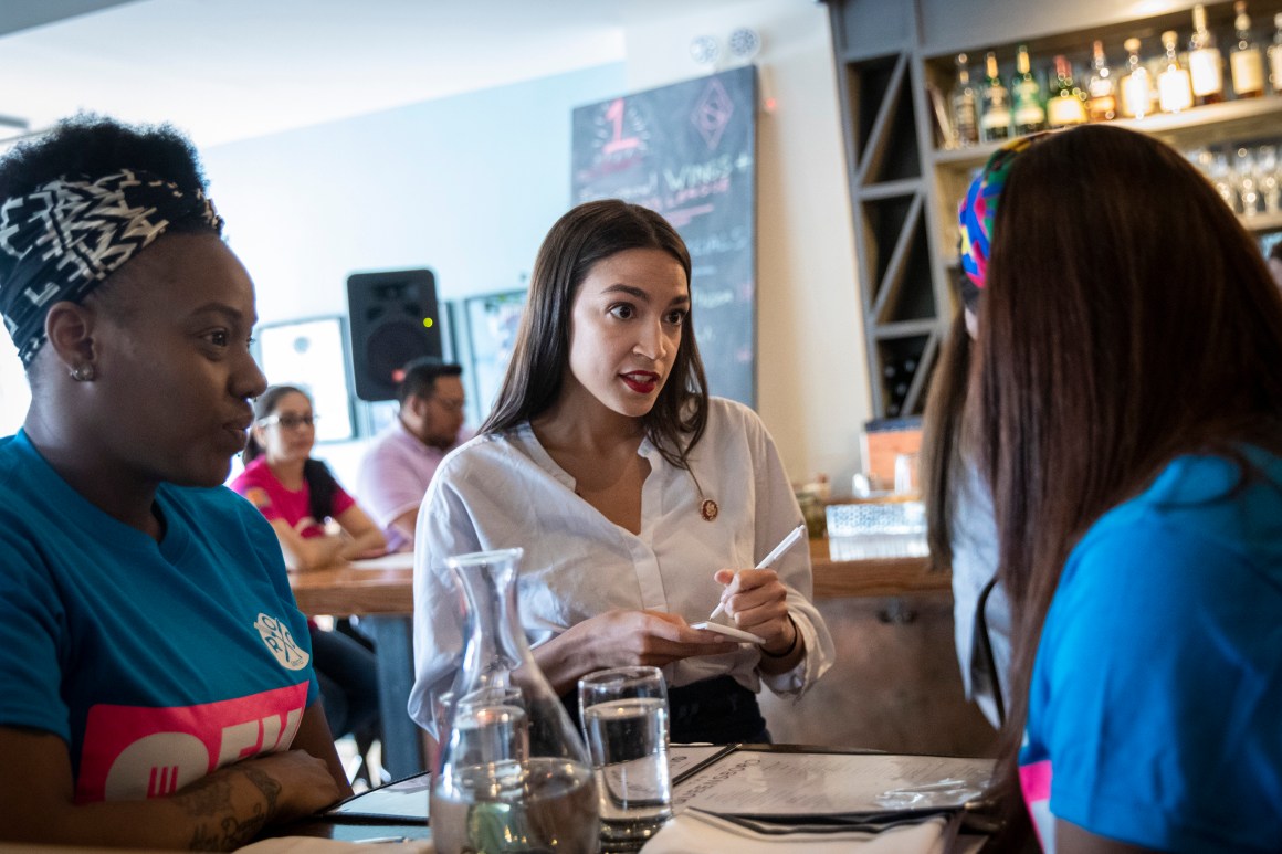 U.S. Representative Alexandria Ocasio-Cortez (D-New York) waits on a table at the Queensboro Restaurant, on May 31st, 2019, in the Queens borough of New York City. Ocasio-Cortez participated in an event to raise awareness for the One Fair Wage campaign, which calls to raise the minimum wage for tipped workers to a full minimum wage at the federal level.