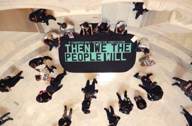 Demonstrators from the pro-impeachment group By the People rally in the Cannon House Office Building Rotunda on Capitol Hill on May 14th, 2019, in Washington, D.C. About 10 members of the protest group were arrested by U.S. Capitol Police while demanding that impeachment proceedings against President Donald Trump begin immediately.