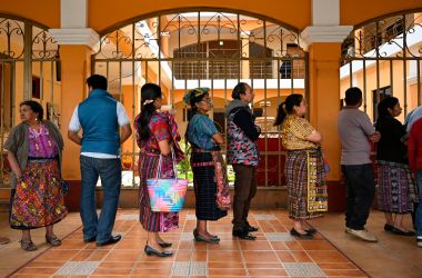 Locals line up to vote at a polling station in San Pedro Sacatepuez, Guatemala, on June 16th, during general elections. Corruption-weary Guatemalans were set to elect a new president Sunday after a tumultuous campaign that saw two leading candidates barred from taking part and the top electoral crimes prosecutor forced to flee the country, fearing for his life.