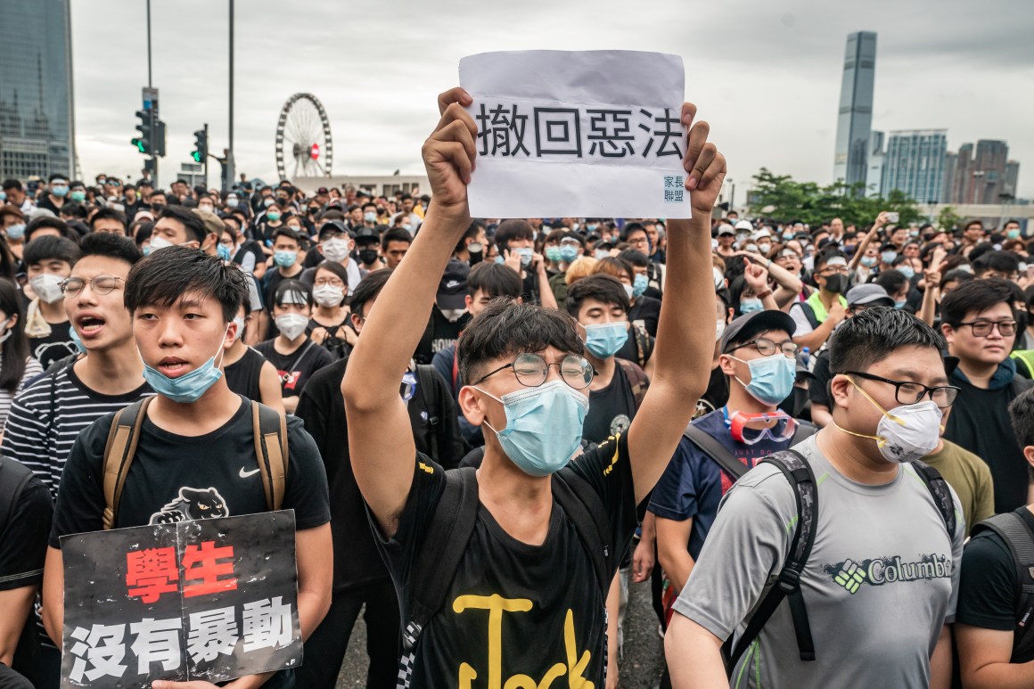 Protesters hold placards and shout slogans as they occupy a street demanding that Hong Kong Chief Executive Carrie Lam step down, after a rally against the now-suspended extradition bill outside of the chief executive office on June 17th, 2019, in Hong Kong, China. The controversial bill would allow Hong Kong citizens suspected of crimes to be extradited to mainland China.