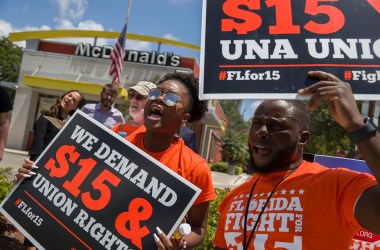 People gather to ask the McDonald’s corporation to raise workers' wages to a $15 minimum wage as well as demand the right to a union on May 23rd, 2019, in Fort Lauderdale, Florida. The nationwide protest was held on the day of the company’s shareholder meeting.