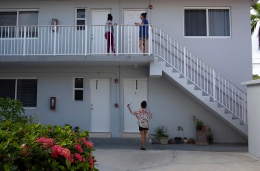 Immigration advocates with the Florida Immigrant Coalition go house to house handing out fliers on July 13th, 2019, in Little Havana in Miami, Florida, in advance of the Trump administration's nationwide immigration enforcement operation targeting migrant families.