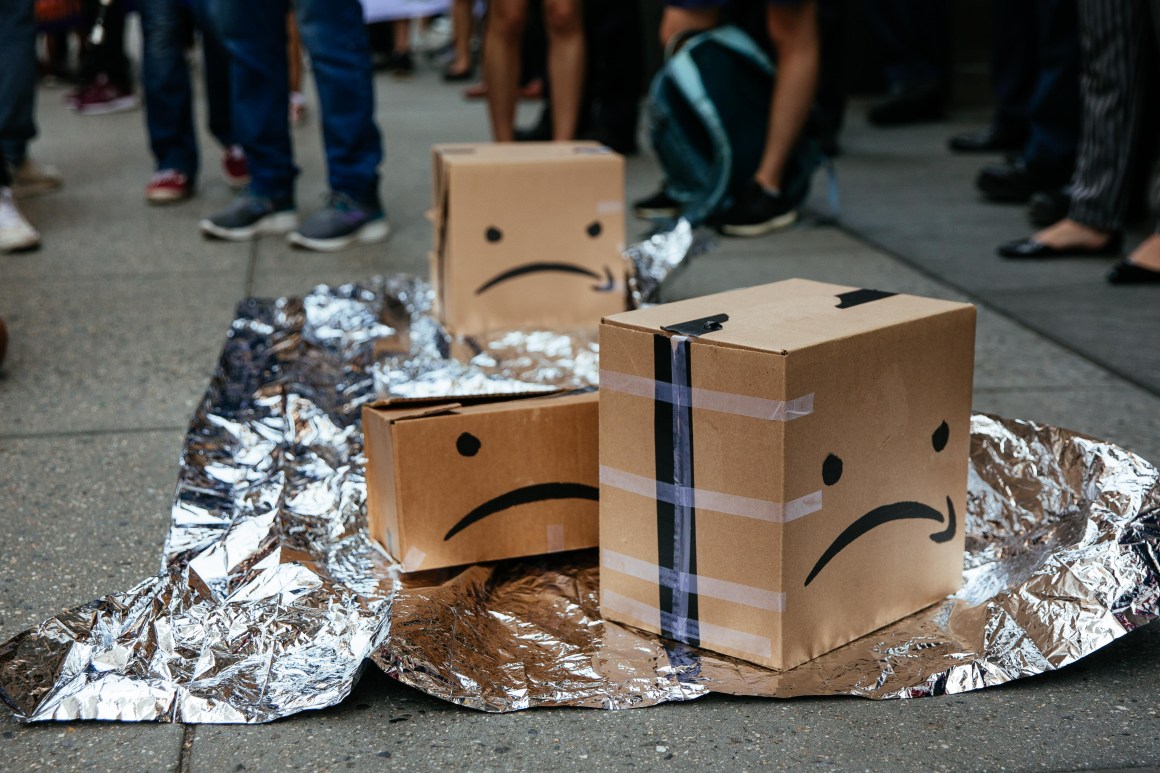 Protesters left boxes on the ground in front of an Amazon store on 34th Street on July 15, 2019, in New York City. The protest, raising awareness of Amazon facilitating ICE surveillance efforts, coincides with Amazon's Prime Day, when Amazon offers discounts to Prime members.