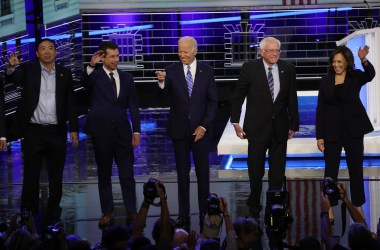 Former tech executive Andrew Yang, South Bend, Indiana, Mayor Pete Buttigieg, former Vice President Joe Biden, Senator Bernie Sanders, and Senator Kamala Harris take the stage for the second night of the first Democratic presidential debate on June 27th, 2019 in Miami, Florida.