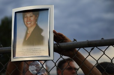 A photo of Elsa Mendoza Marquez, a Mexican schoolteacher who was the mother of two adult children, is displayed at an interfaith vigil for victims of a mass shooting, which left at least 20 people dead, including Marquez, on August 4th, 2019, in El Paso, Texas. At least 26 people were wounded.