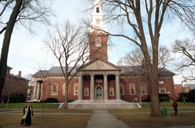 People walk around Harvard University's main campus.