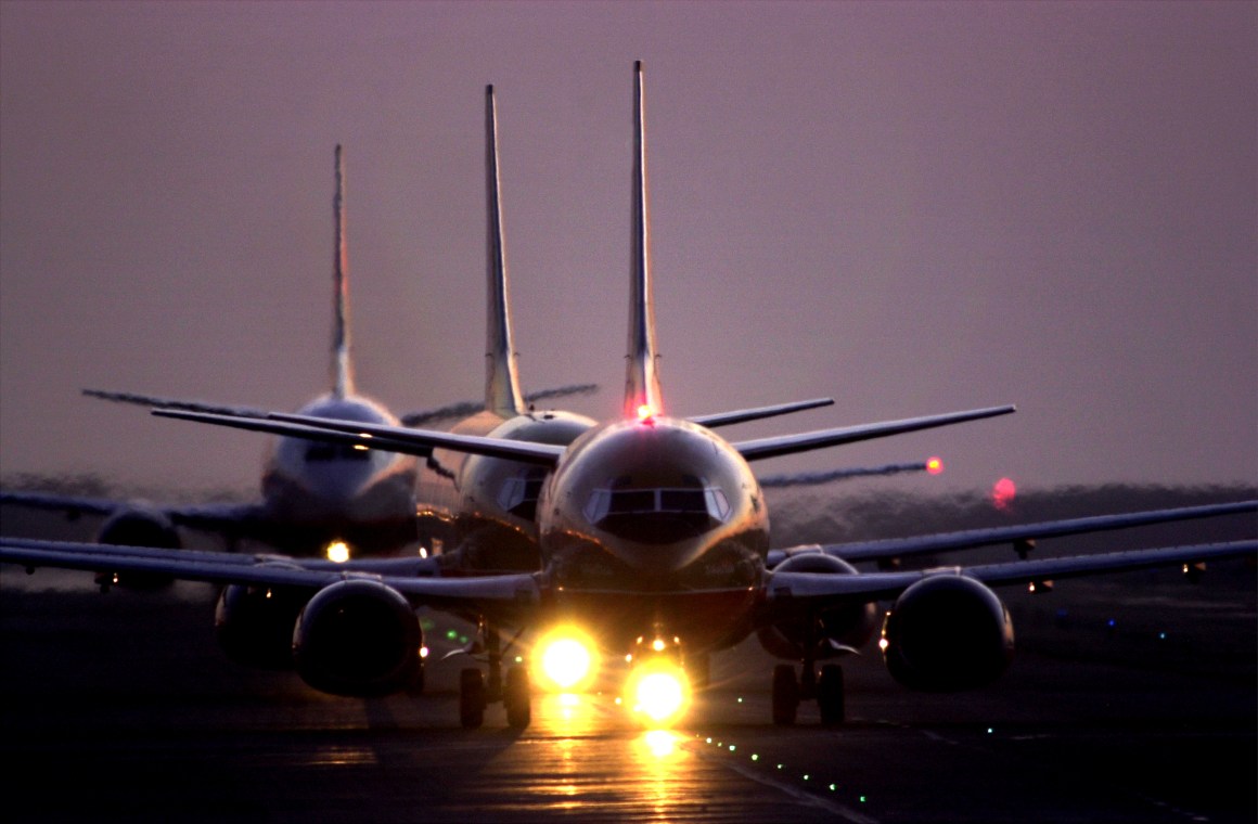 Jets taxi after sunset June 21st, 2001, at Los Angeles International Airport.