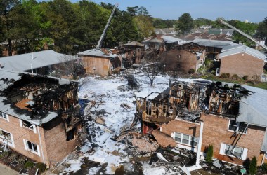 Firefighting foam covers the scene of a crash of an F/A-18D Hornet on April 6th, 2012, in Virginia Beach, Virginia.