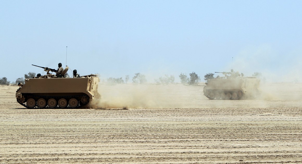 Iraqi soldiers train by foreign contractors in the Besmaya military base in southern Baghdad.