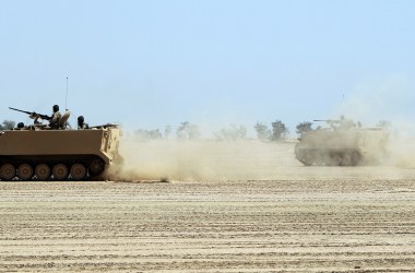 Iraqi soldiers train by foreign contractors in the Besmaya military base in southern Baghdad.