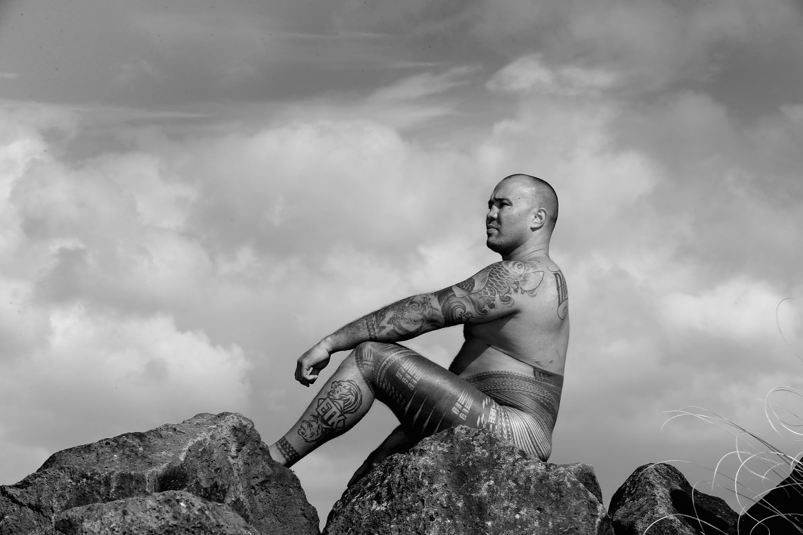 Jason Suttie displays his pe'a, a traditional Samoan tattoo in Auckland, New Zealand.