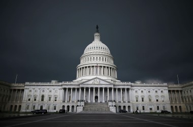 Storm clouds fill the sky over the U.S. Capitol Building.