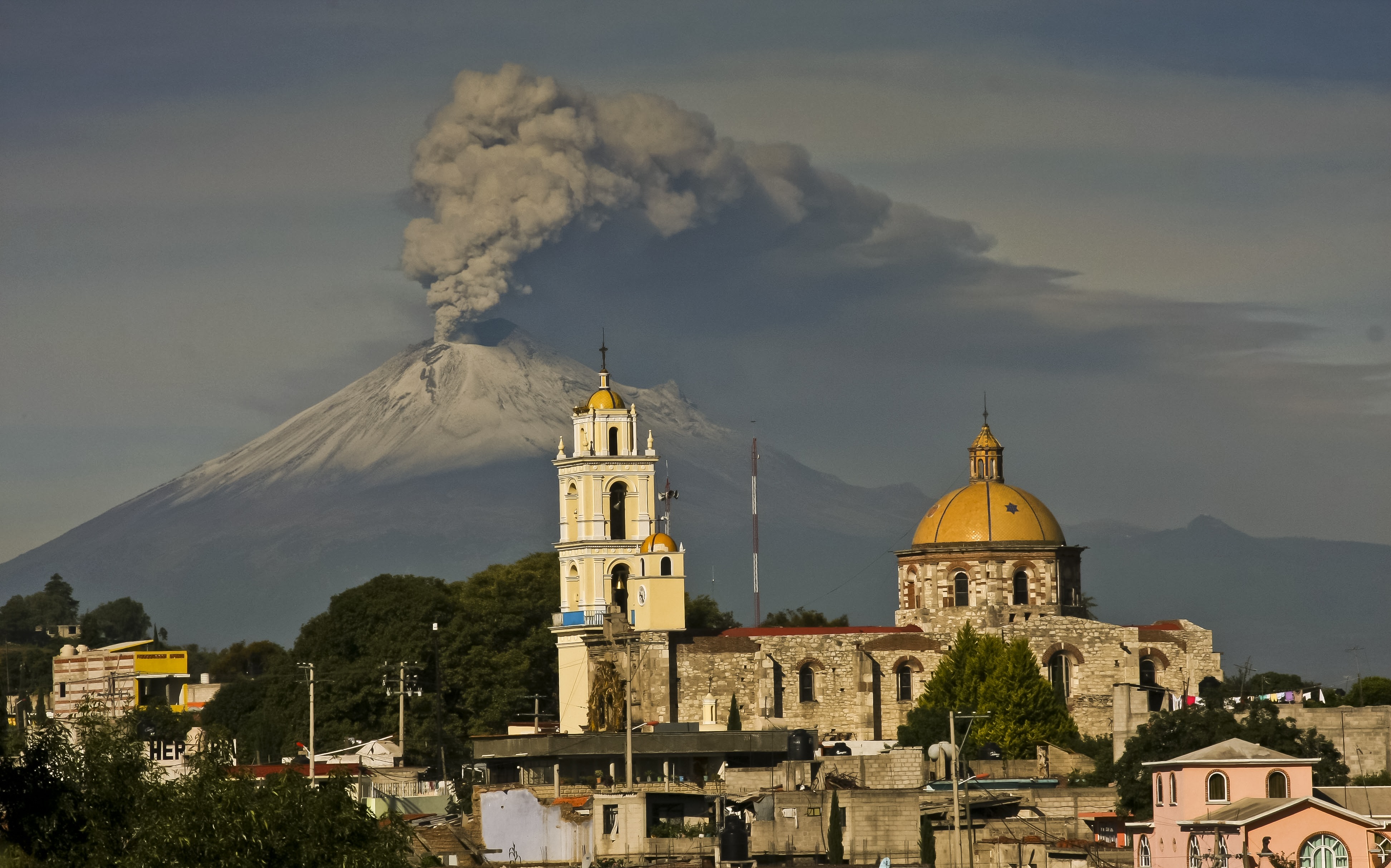 Ash spews from Popocatepetl, as seen from San Damian Texoloc municipality, on July 9th, 2013.