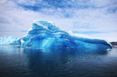 Calved icebergs from the nearby Twin Glaciers are seen floating on the water in Qaqortoq, Greenland.