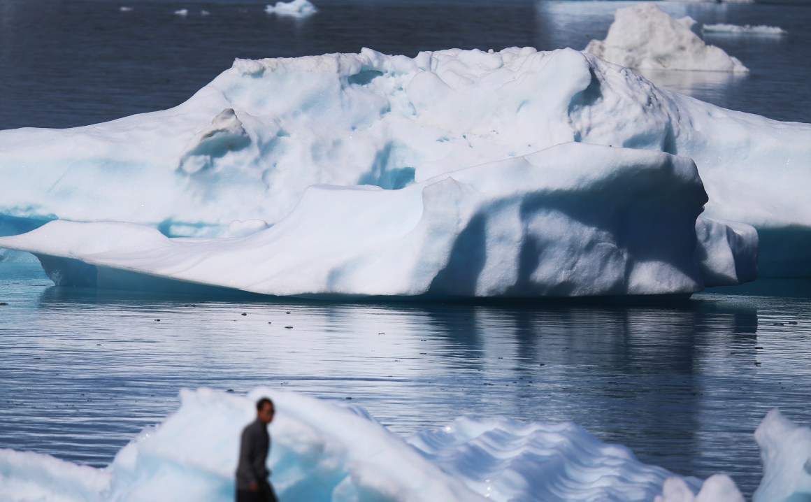 Icebergs are seen floating in the water on July 30th, 2013, in Narsaq, Greenland.