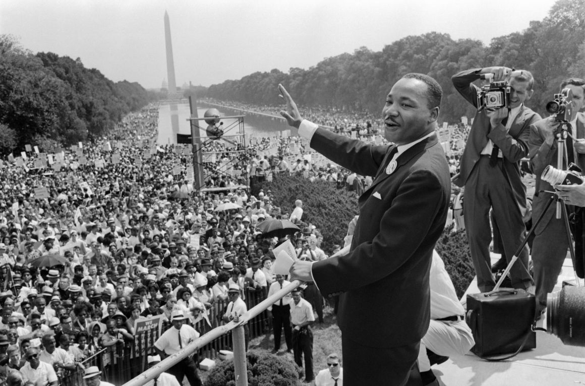 The civil rights leader Martin Luther King Jr. waves to supporters on August 28th, 1963, on the Mall in Washington, D.C.