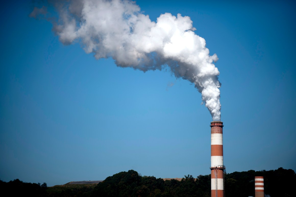 A plume of exhaust extends from the Mitchell Power Station.