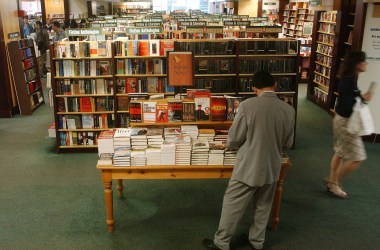 A customer shops at Barnes and Noble in Rockefeller in New York City.